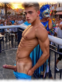 Blonder Twink beim Straßen-Karneval stehend, stolzer Schaft der Sehnsucht im Profil. Blonder Twink beim Straßen-Karneval stehend, stolzer Schaft der Sehnsucht im Profil.