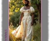 Dunkelhäutiger Bartträger im Sommer-Kleid, großzügiges Dekolleté, am Waldrand. Dunkelhäutiger Bartträger im Sommer-Kleid, großzügiges Dekolleté, am Waldrand.